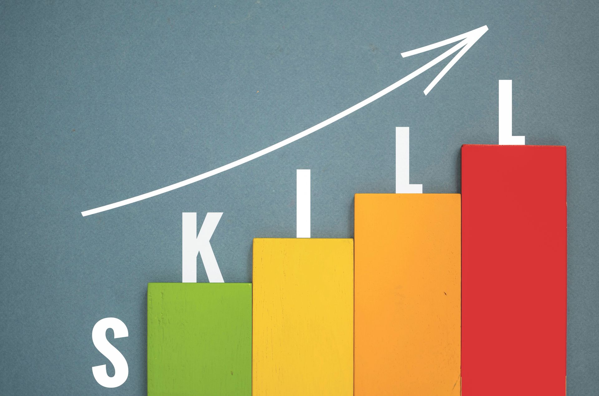 A large aluminum container with a valve, possibly used for fuel or chemicals. Darkened with soot.