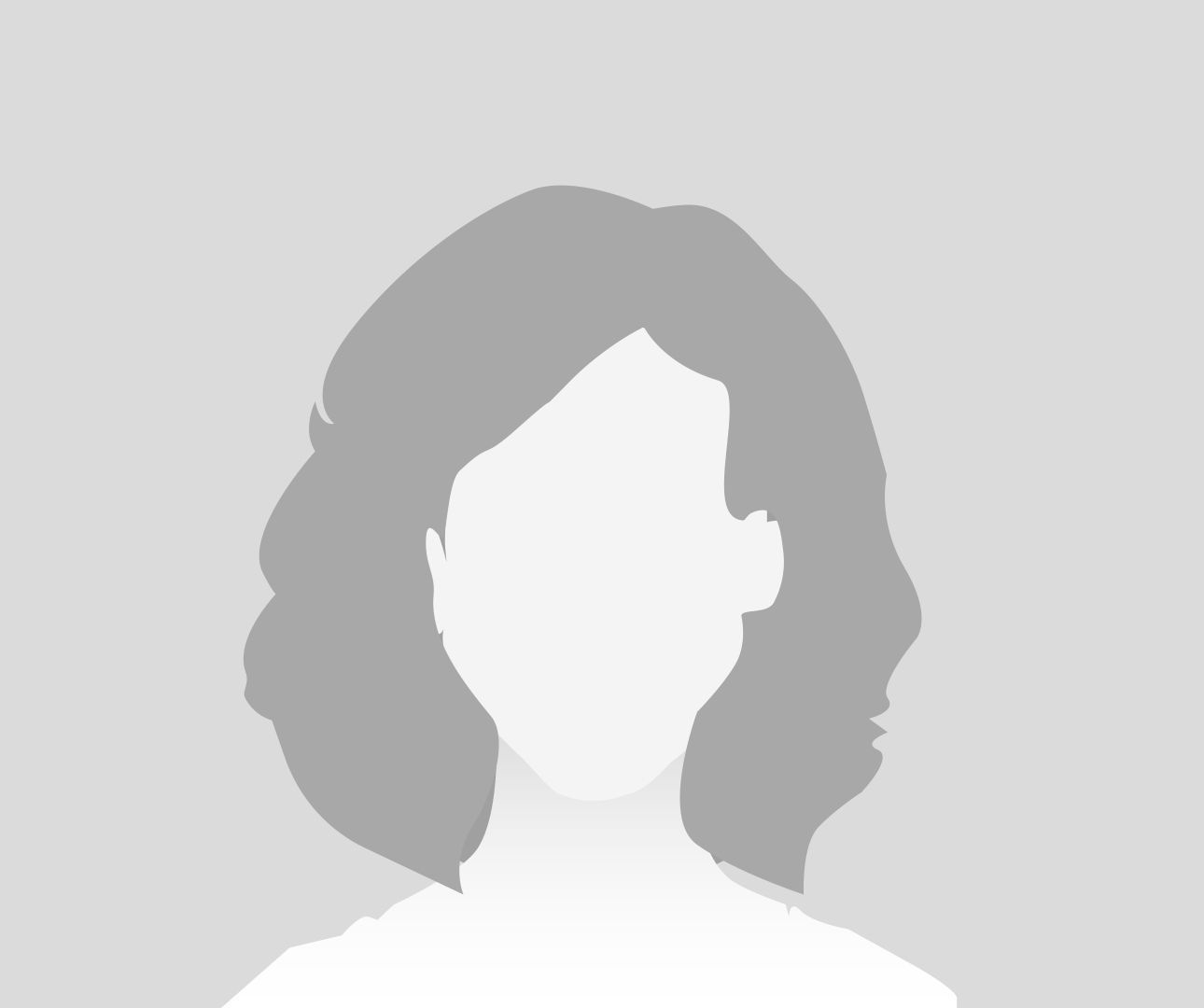 Silhouette of a person with short, wavy hair. Facing forward, with a neutral expression, against a gray background.