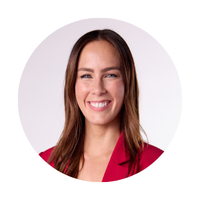 Blonde woman smiling on pink background