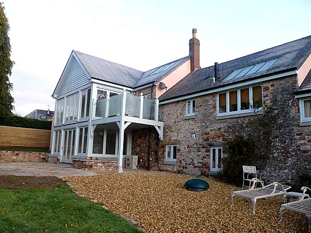 Exterior landscaping with gravelled area