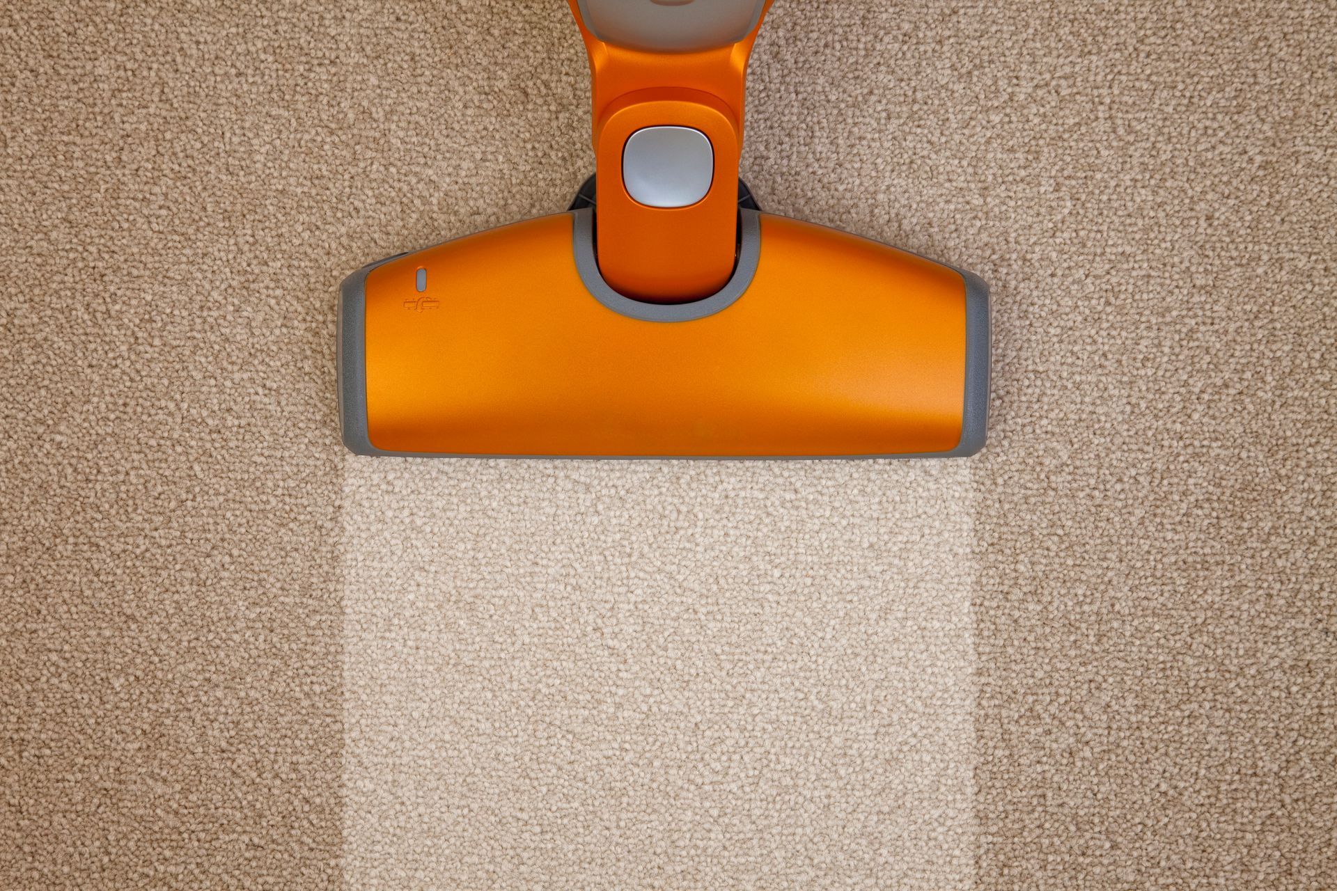 Vacuum cleaner leaving a carpet area clean