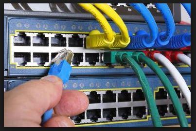 Ethernet cables being plugged in