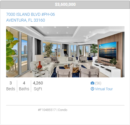 A picture of a living room with a large flat screen tv.