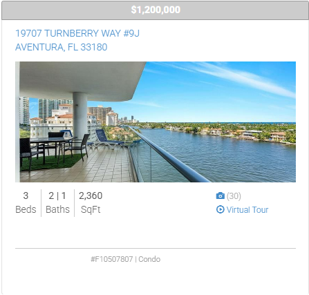 A picture of a balcony overlooking a body of water