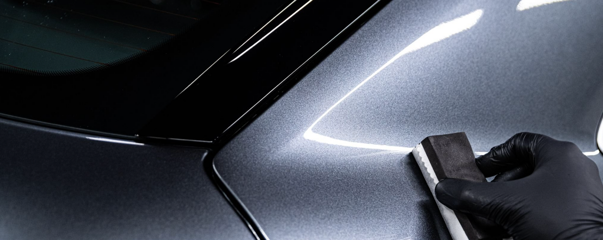 Man Putting Paint On A Car β Townsville Car Care Centre In Aitkenvale, QLD