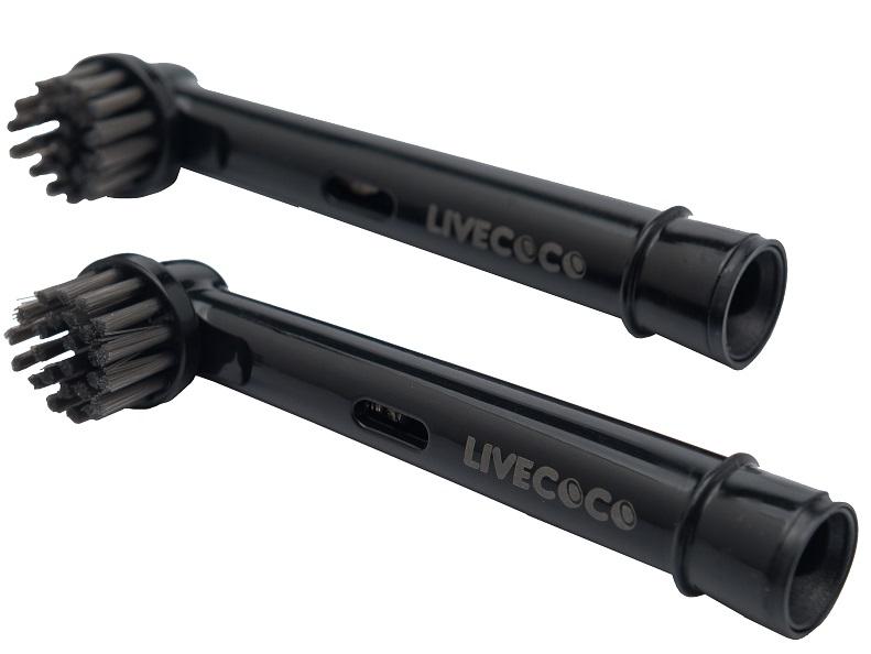 A pair of black livecoco brushes on a white background