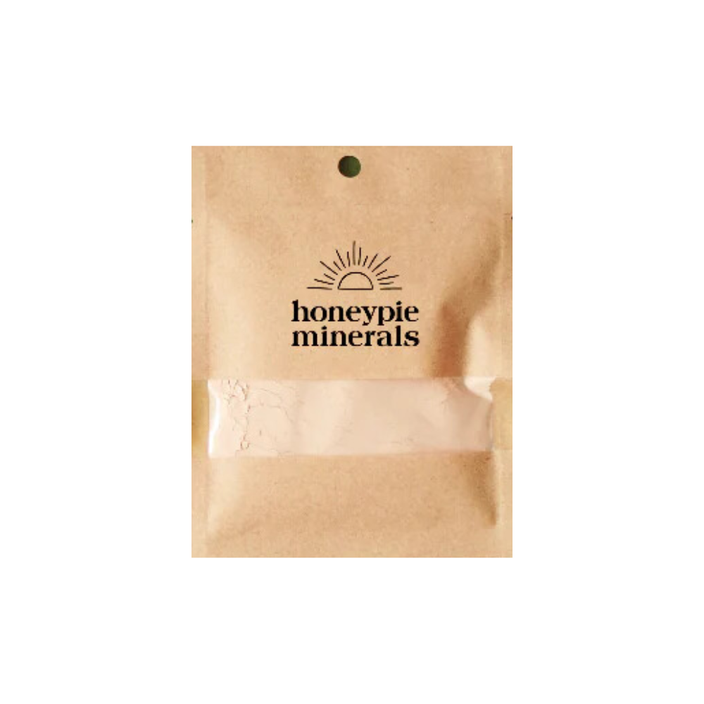 A small bag of honeypie minerals with a sun on it