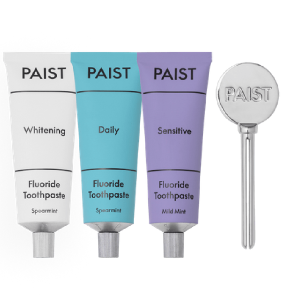 three tubes of PAIST fluoride toothpaste in Whitening, Daily and Sensitive options.