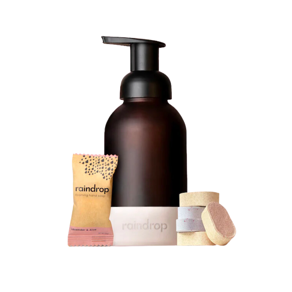 a bottle of raindrop foaming hand soap next to Raindrop dissolvable tabs