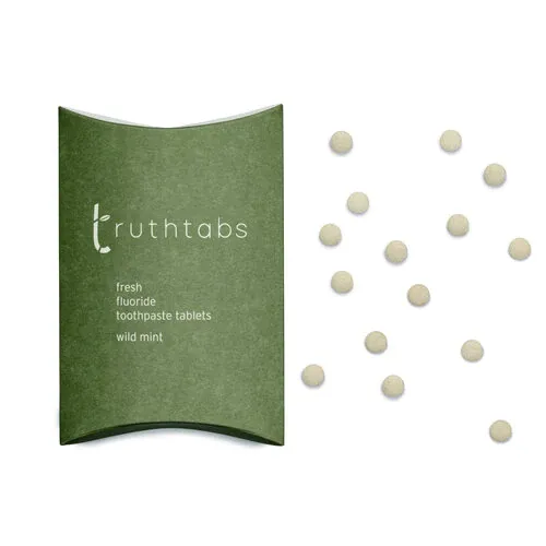 A green box of truthtabs toothpaste tablets