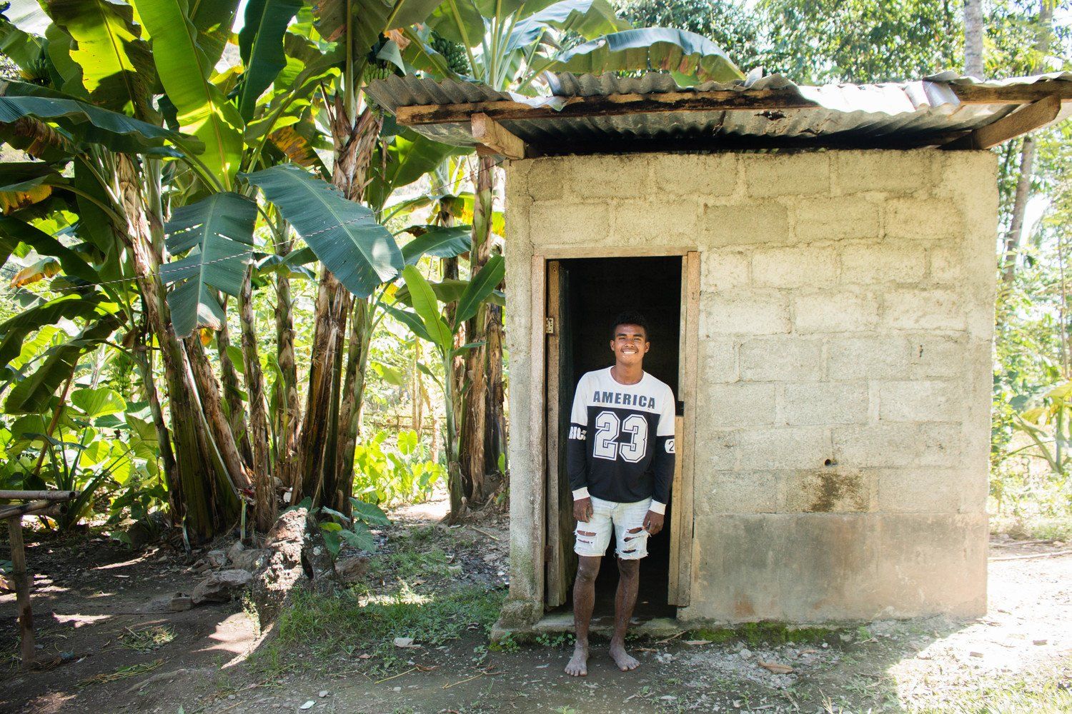 a man wearing a jersey with the number 23 on it
