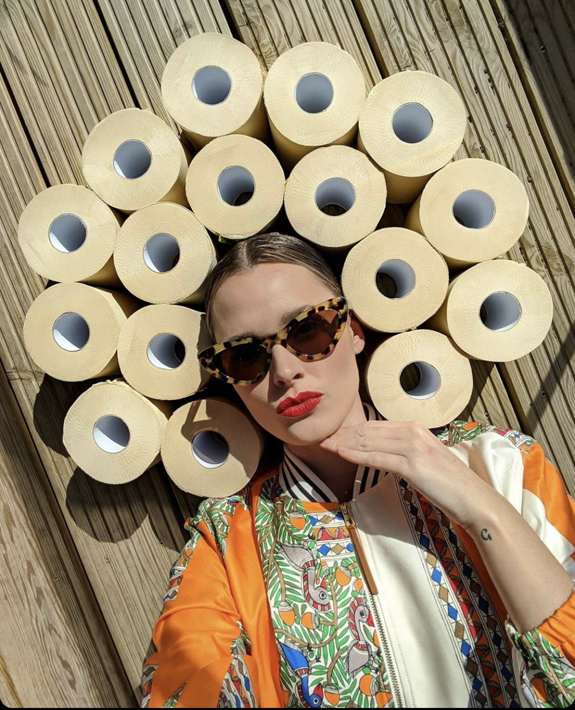 Woman with unbleached bamboo toilet paper