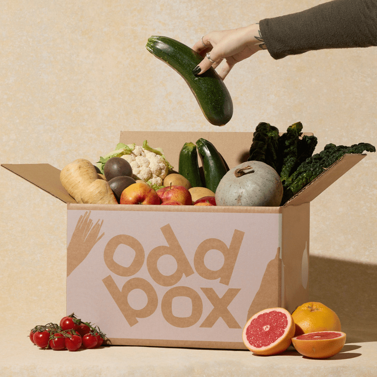 a homey pikt box filled with fruits and vegetables