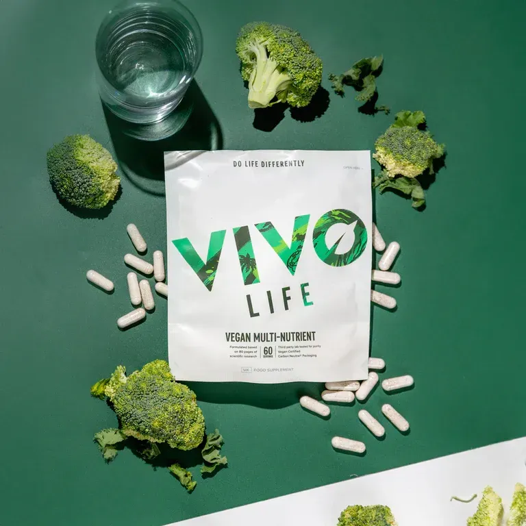 Two bags of vegan multi nutrient are sitting on a table.