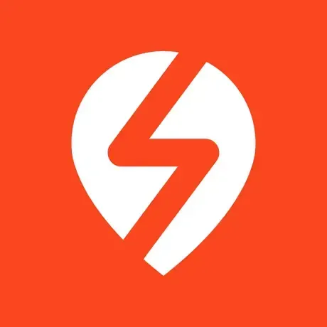 A white lightning bolt in a red circle on a red background