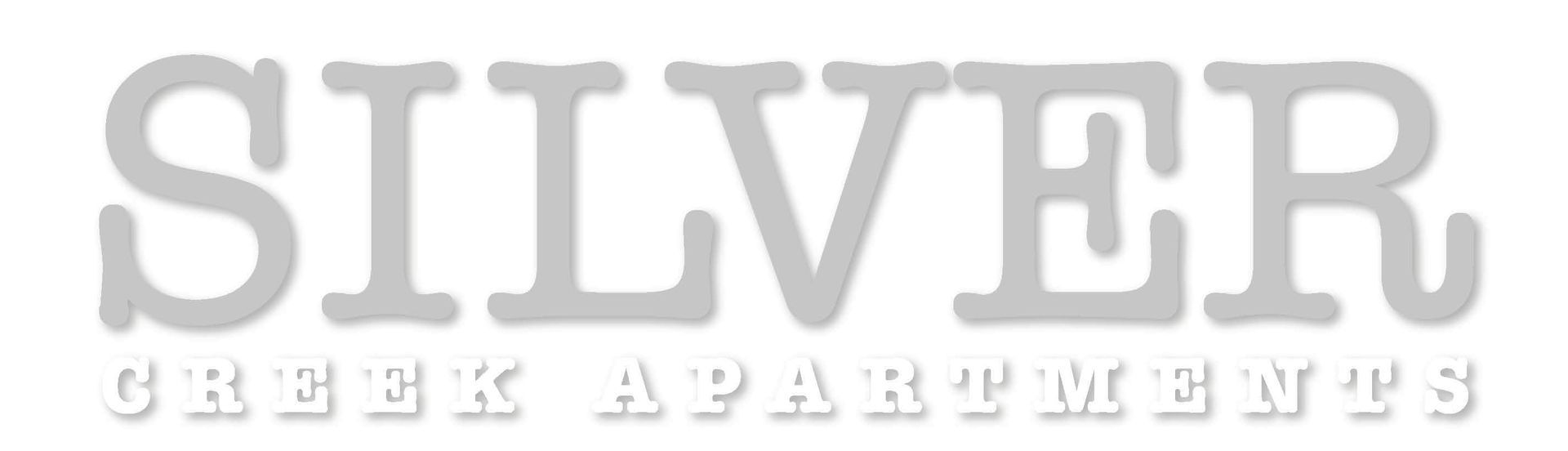 Light gray logo for Silver Creek Apartments, with the name in large, bold letters above smaller, capitalized text.