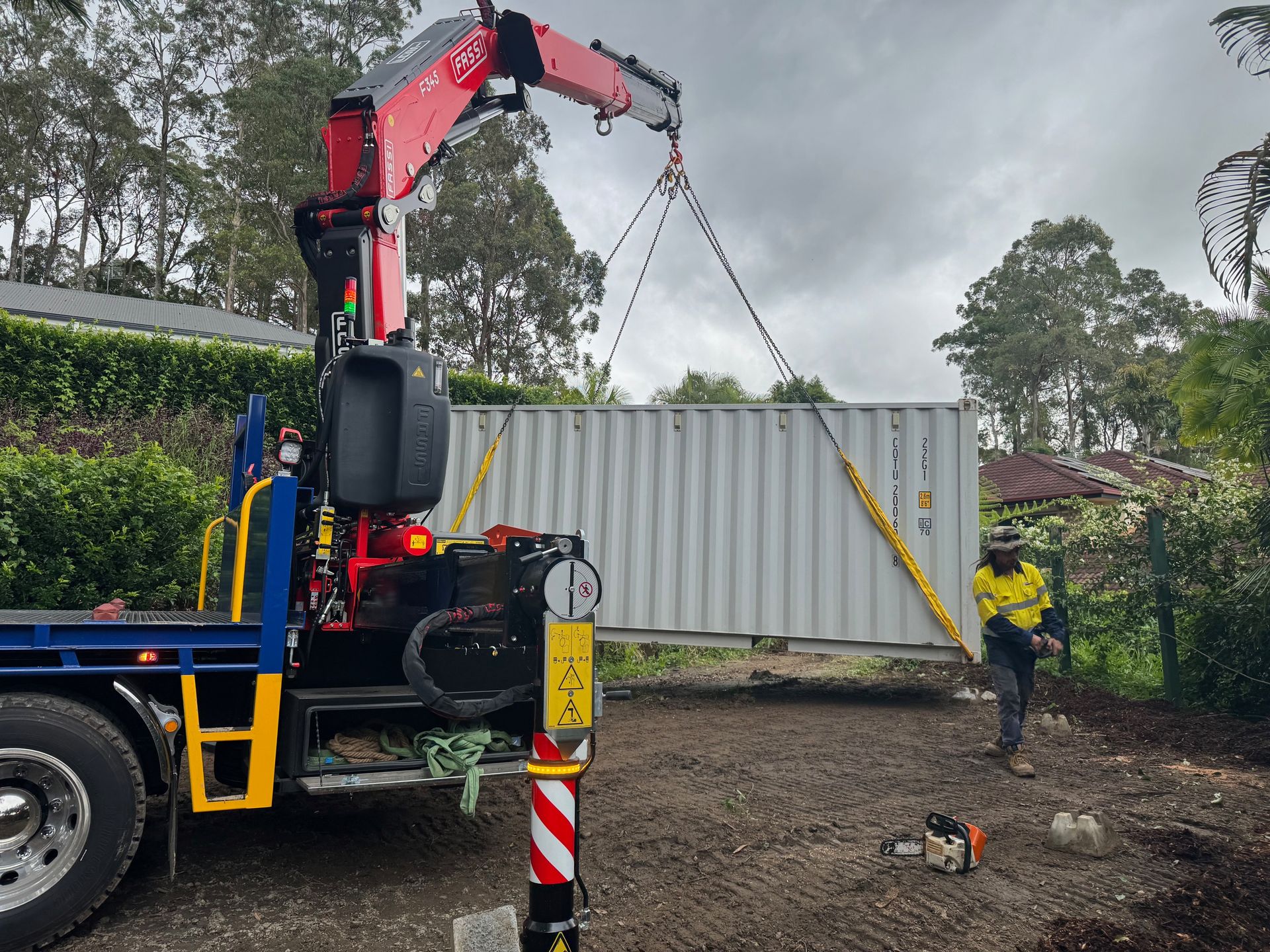 A Blue and White Towing Truck is Parked in a Parking Lot — Mick's Towing Service Pty Ltd in Carrara, QLD