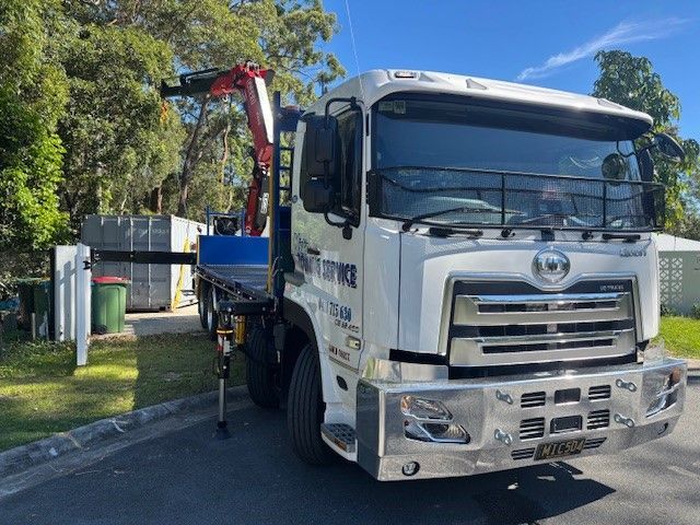 Crane Truck Loading Container — Mick's Towing Service Pty Ltd in Carrara, QLD