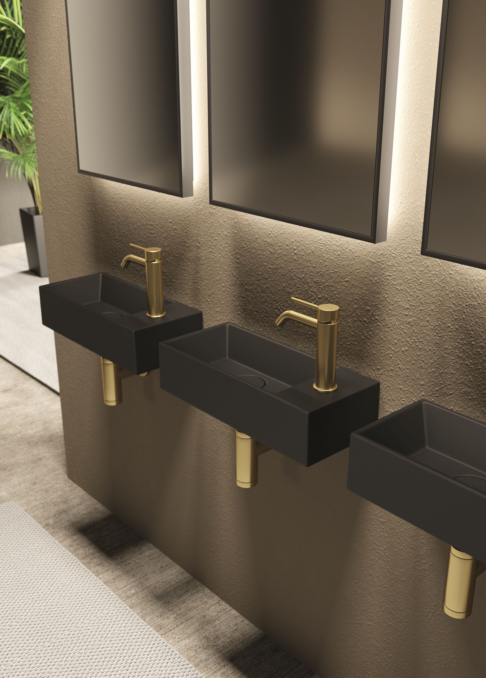 Lave mains en céramique noir mat  Alice Ceramica
Mitigeur et syphon bouteille or brossé.
