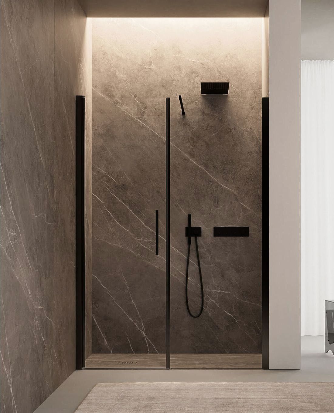 Une salle de bain avec douche à l'italienne avec porte vitrée.
Cabine de douche mur à mur Disenia