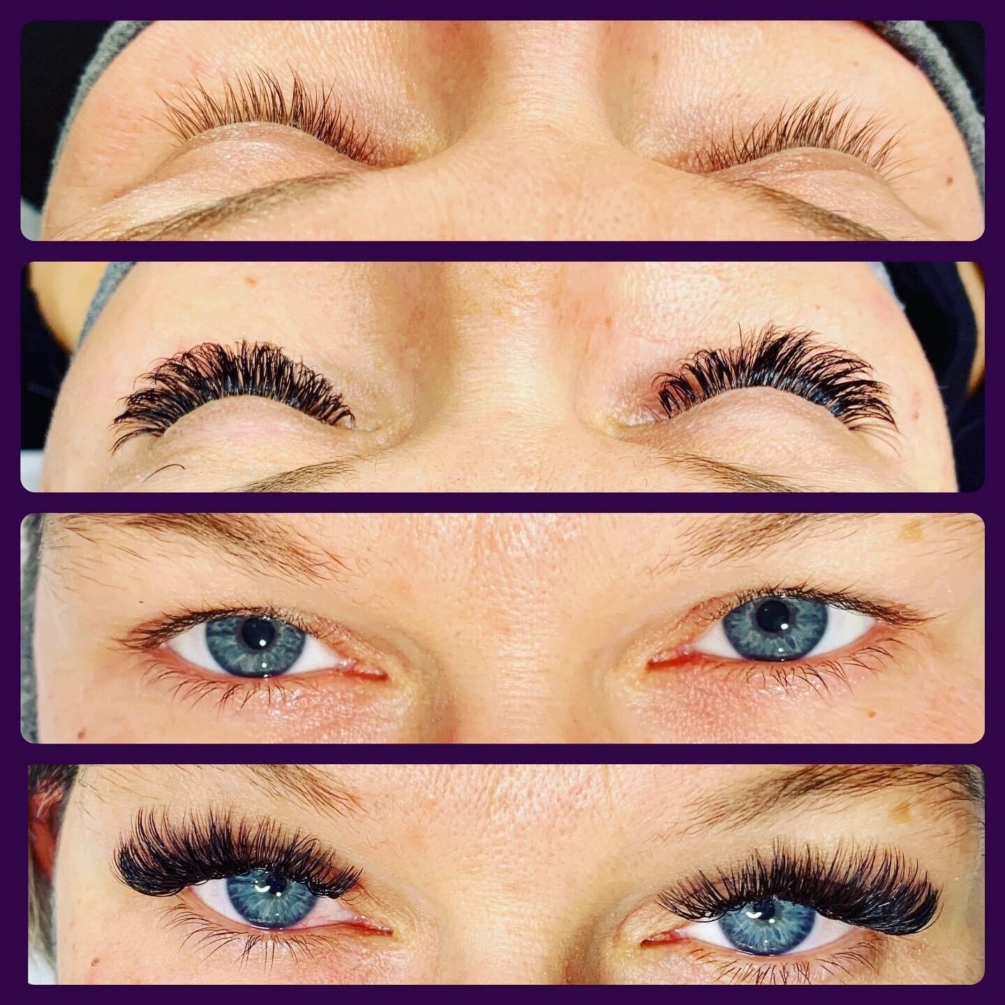 A close up of a woman 's blue eyes with long eyelashes