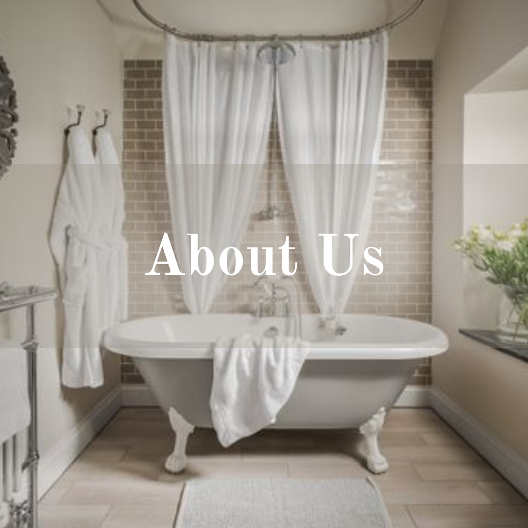 About us, Cotswold Tiger Laundry - white roll top bath with fluffy white dressing gowns hanging up | Cotswold Tiger Laundry
