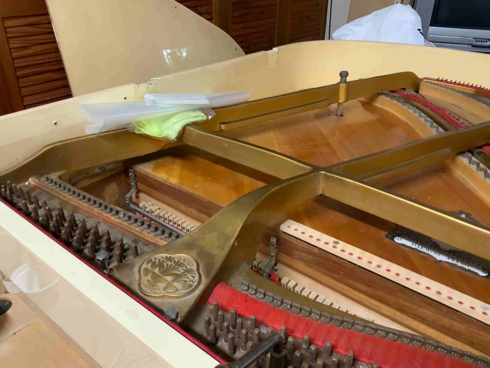 The Inside Of A Grand Piano Is Shown With The Lid Open — Doug Simpson Piano Tuning In Gordonvale, QLD