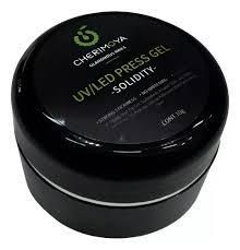 Tarro negro de gel prensado UV/LED de chirimoya, con texto verde y blanco en la tapa.