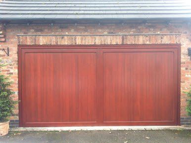 wooden garage door restored