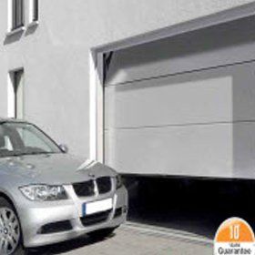 Sectional garage doors and car