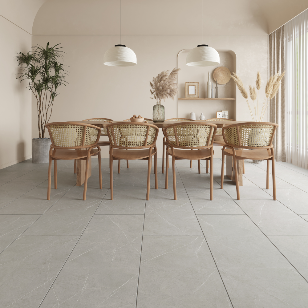 Dining room with wood table and chairs, tan walls, gray tile floor, and pendant lights. Dining room with wood table and chairs, tan walls, gray tile floor, and pendant lights.