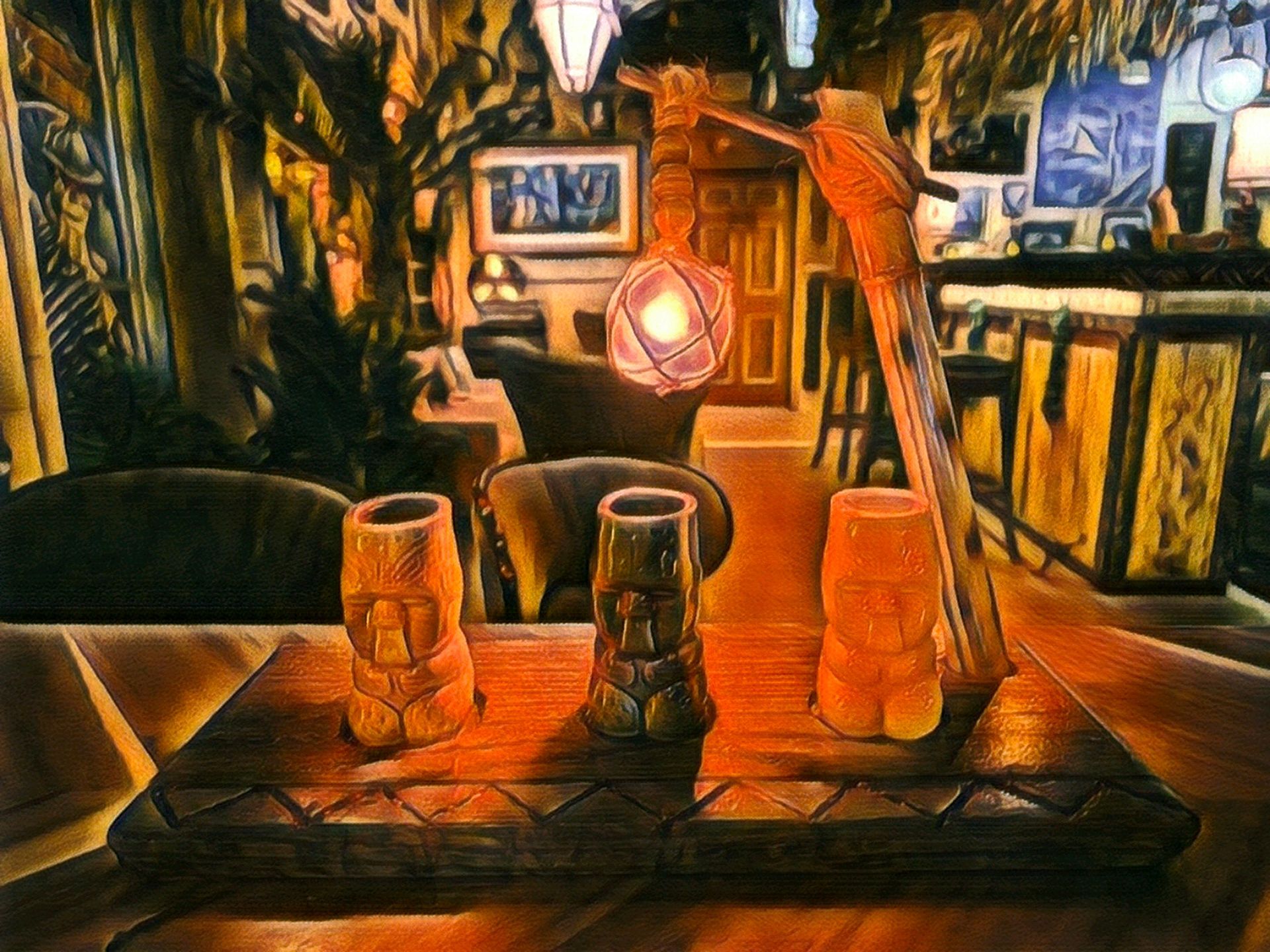 Tiki bar scene with carved mugs, glowing pendant light, and blurred bar in background.