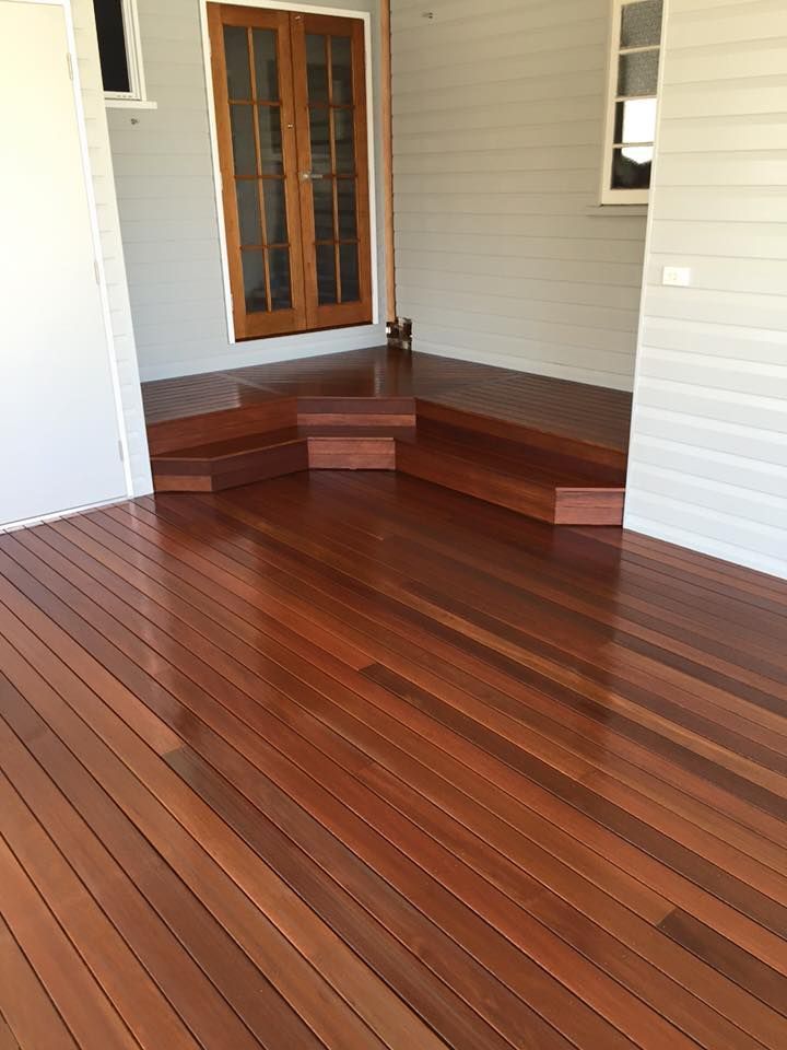 A Verandah with Shiny Flooring and a Door in Background — Floor Sanding in Kearneys Spring, QLD