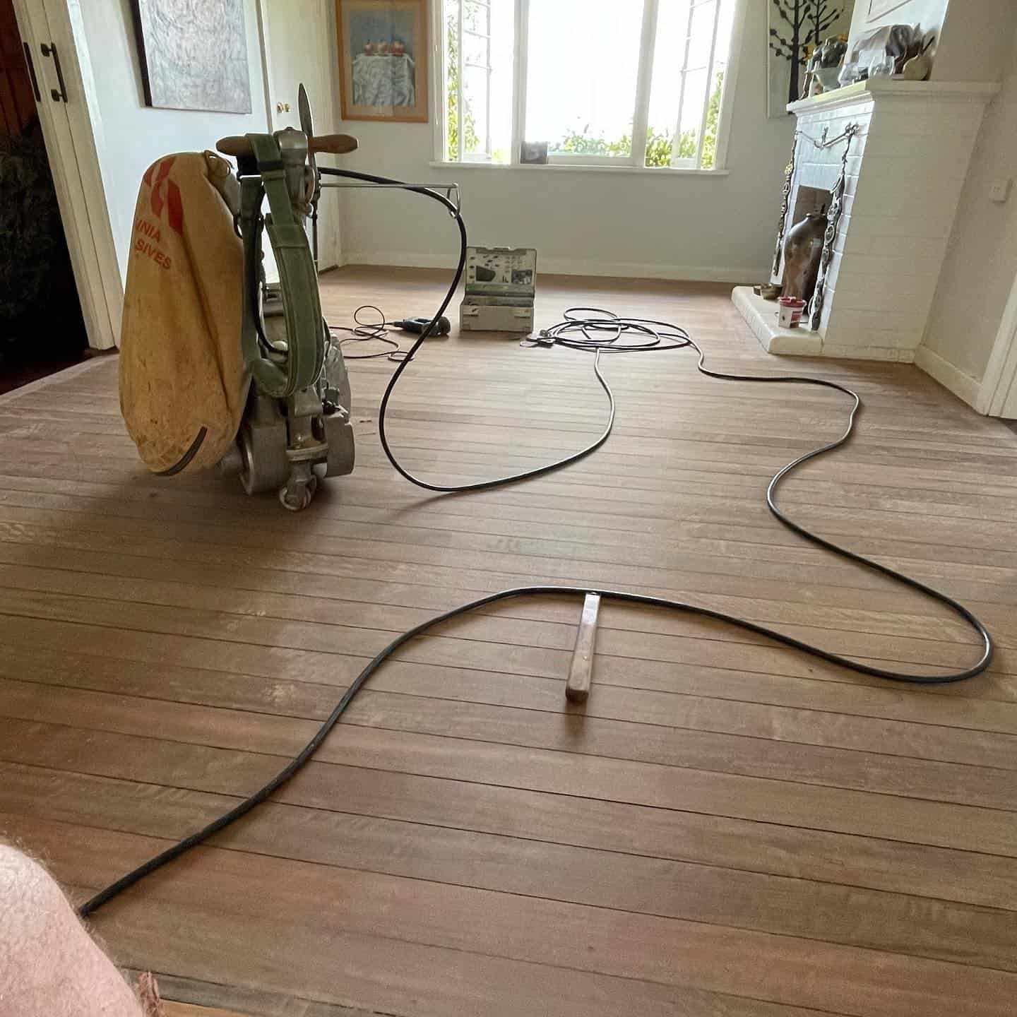 Timber Floor Sanding in Process with Lot of Equipments — Floor Sanding in Kearneys Spring, QLD