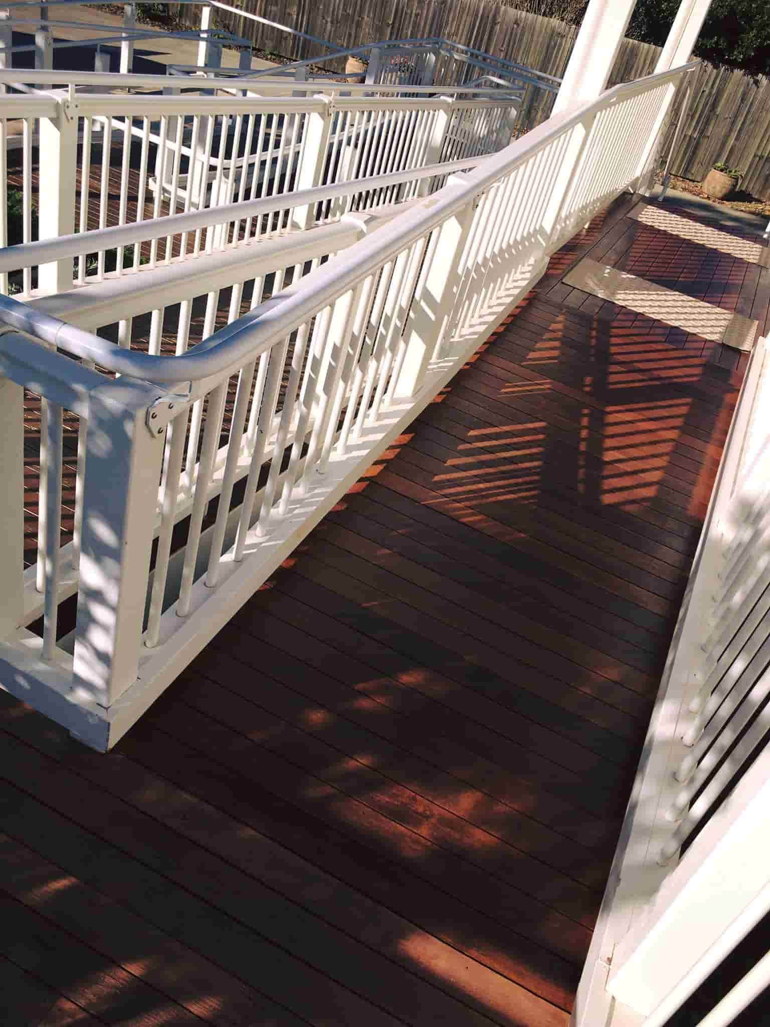 Wooden Planks Floor with White Railings — Floor Sanding in Kearneys Spring, QLD