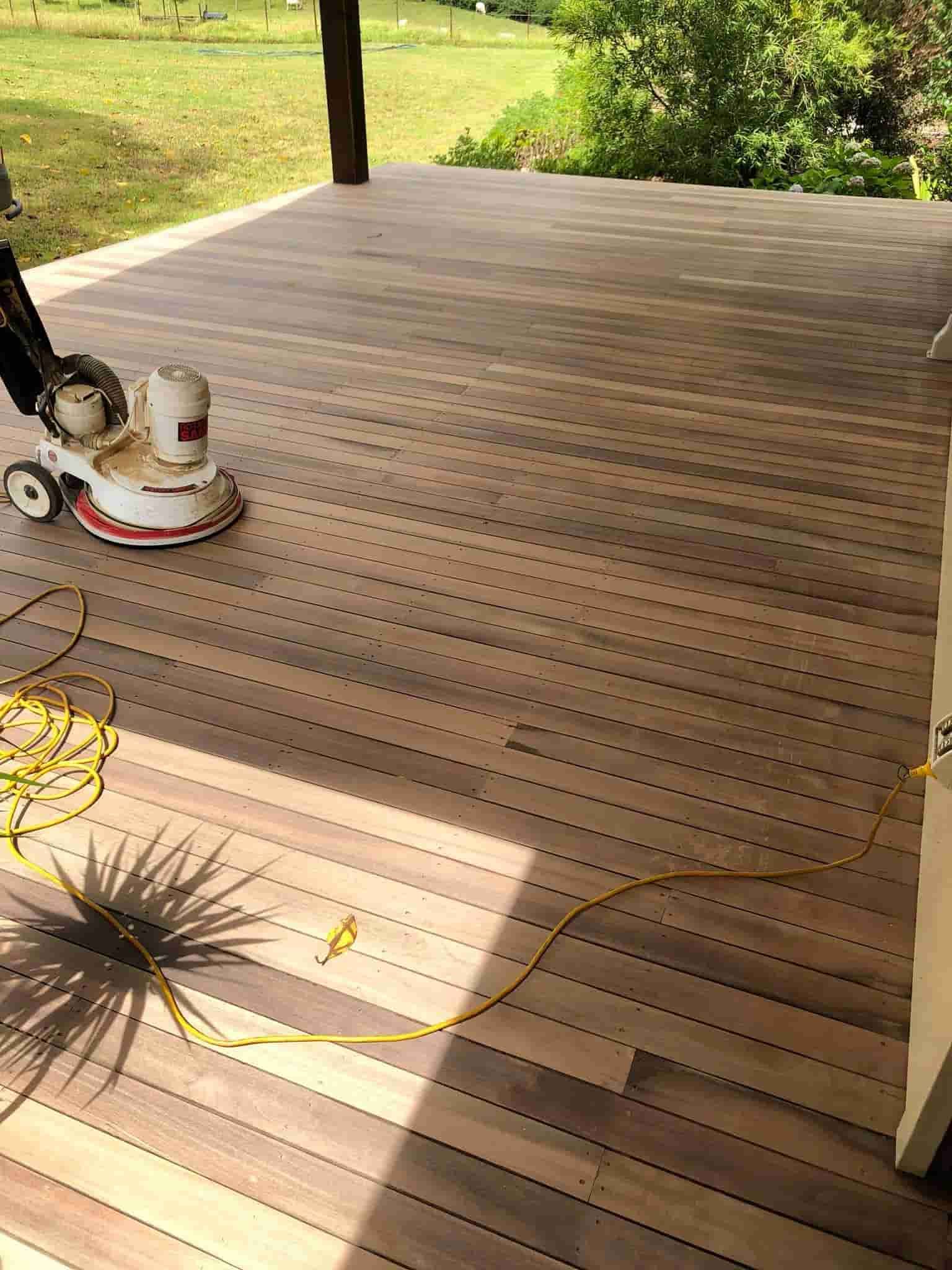 Sanding The Floor at the Verandah with Green Grass Lawn in Background — Floor Sanding in Kearneys Spring, QLD