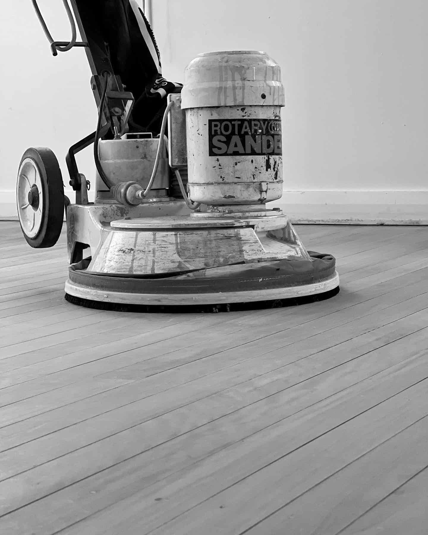 Rotary Sanding Machine in Process of Sanding a Wooden Floor — Floor Sanding in Kearneys Spring, QLD