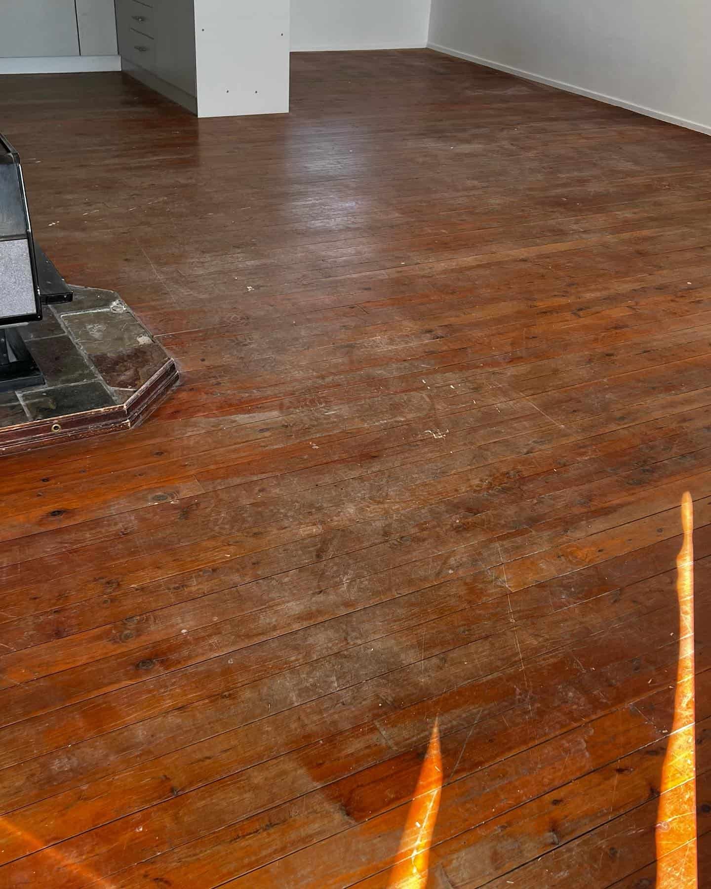 Dirty Floor in Process of Sanding with Sanding Machine — Floor Sanding in Kearneys Spring, QLD