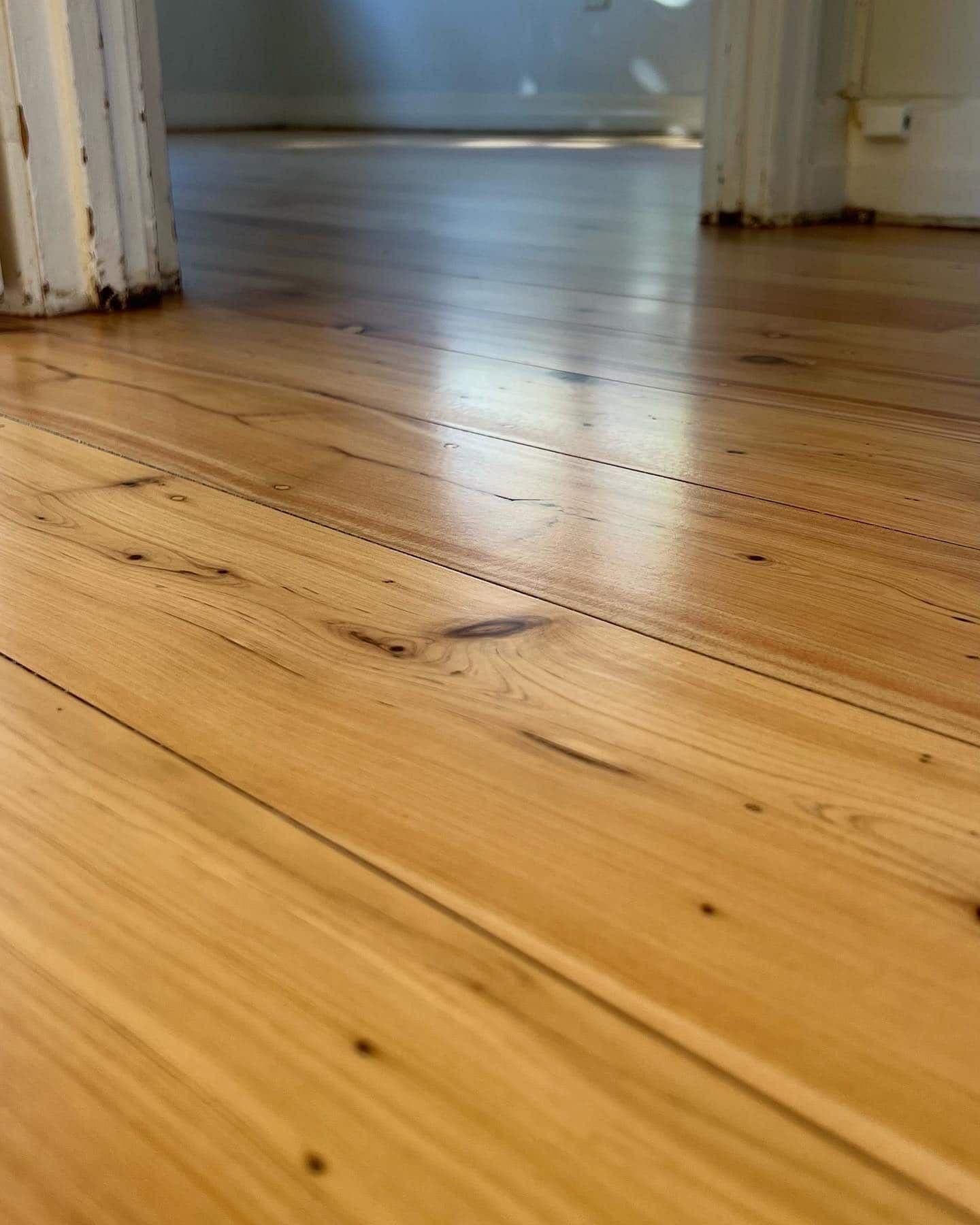 Shiny Wooden Floor with Few Black Spots — Floor Sanding in Kearneys Spring, QLD