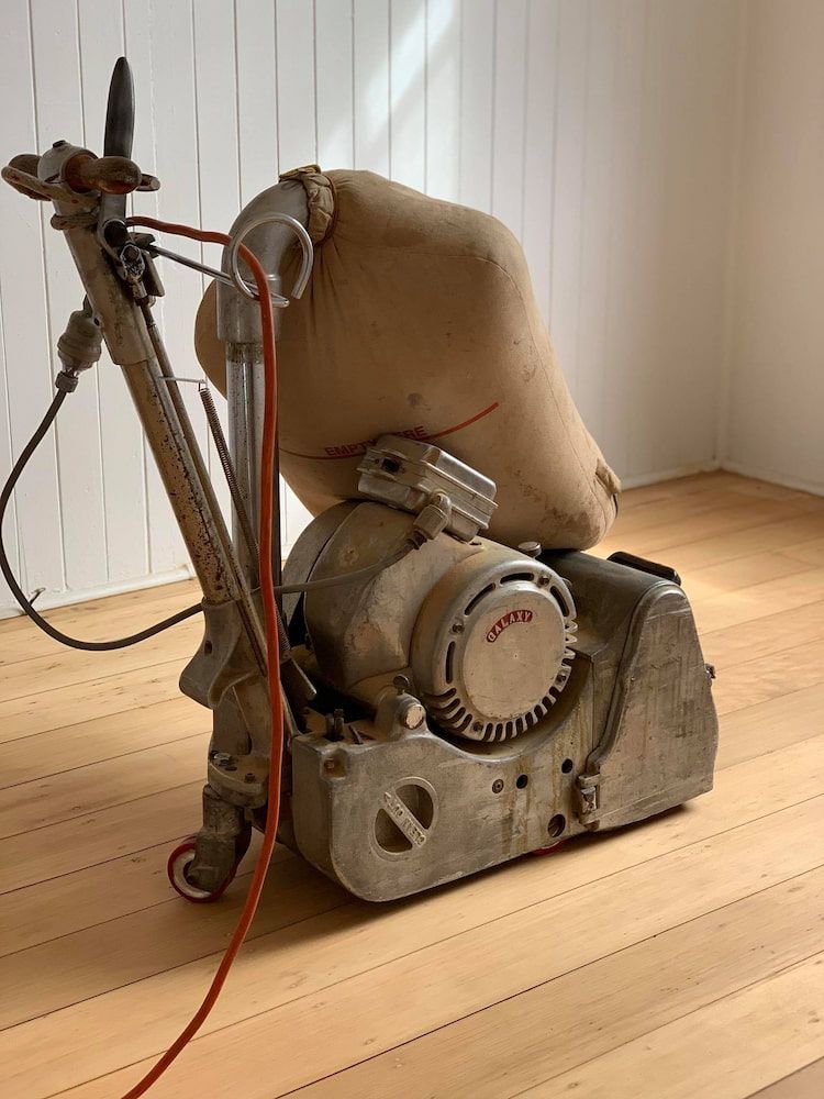 Floor Sanding Machine Having a Red Wire Connected to it — Floor Sanding in Kearneys Spring, QLD