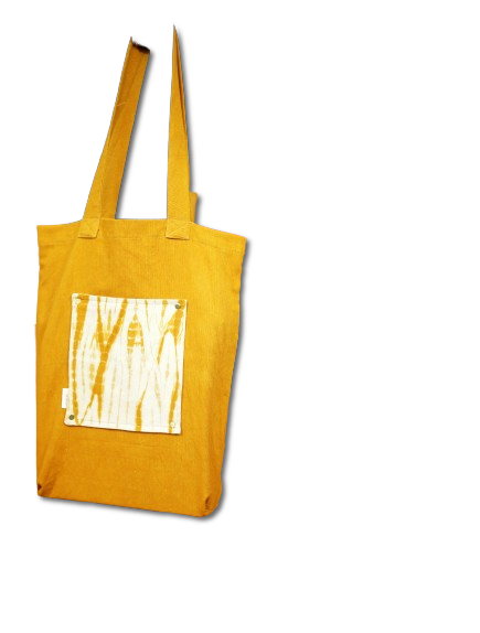Un sac fourre-tout jaune avec une photo d'une femme dessus