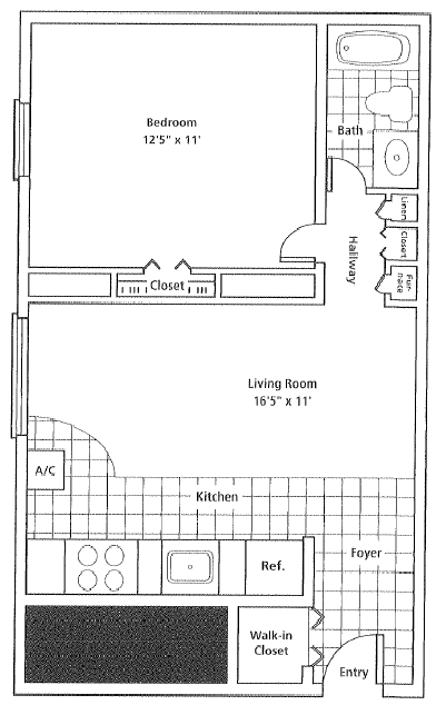Floor plan of an apartment; shows a bedroom, living room, kitchen, bathroom, and walk-in closet.