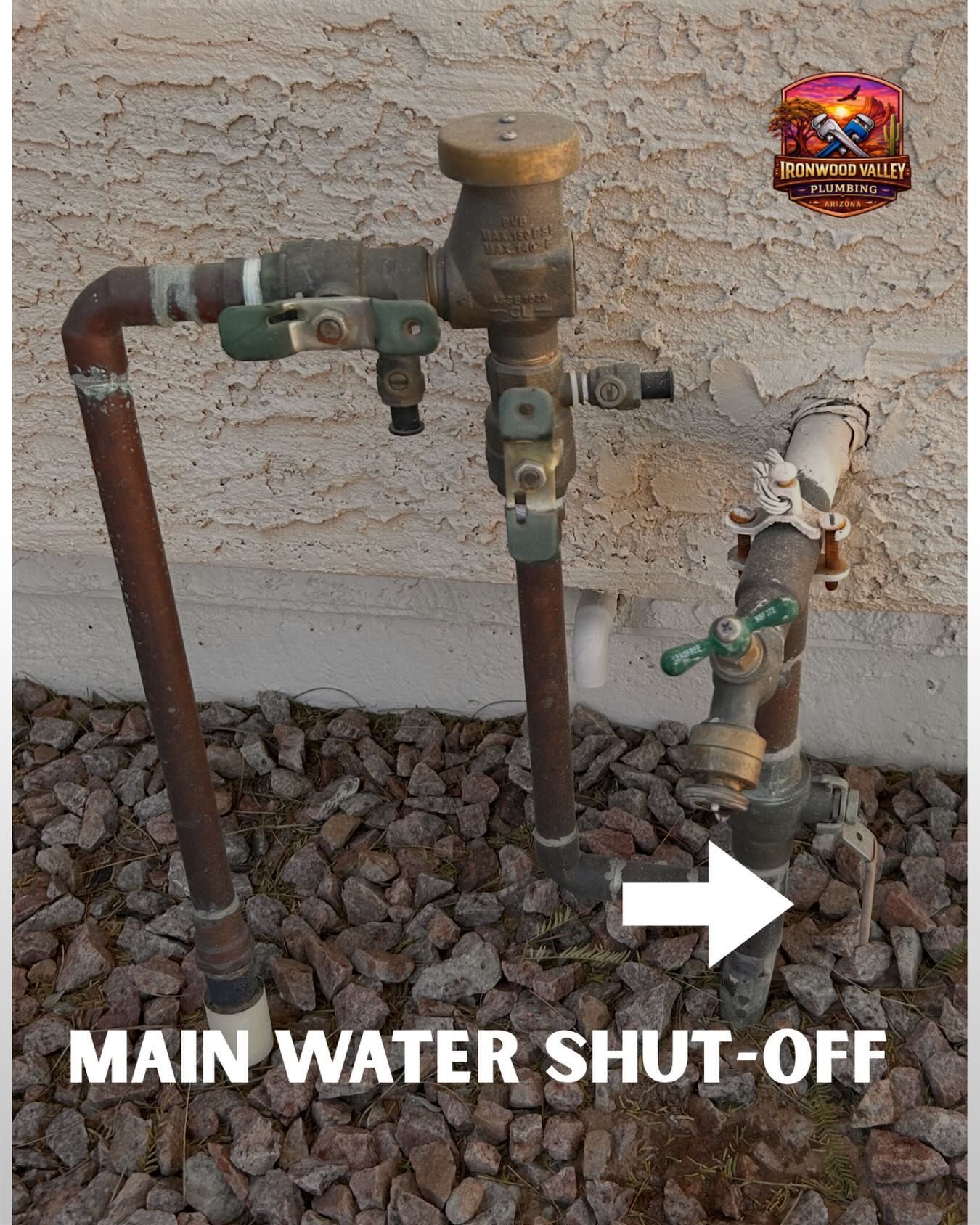 A brass backflow prevention assembly next to a water spigot, with a white arrow pointing to the main water shut-off valve.