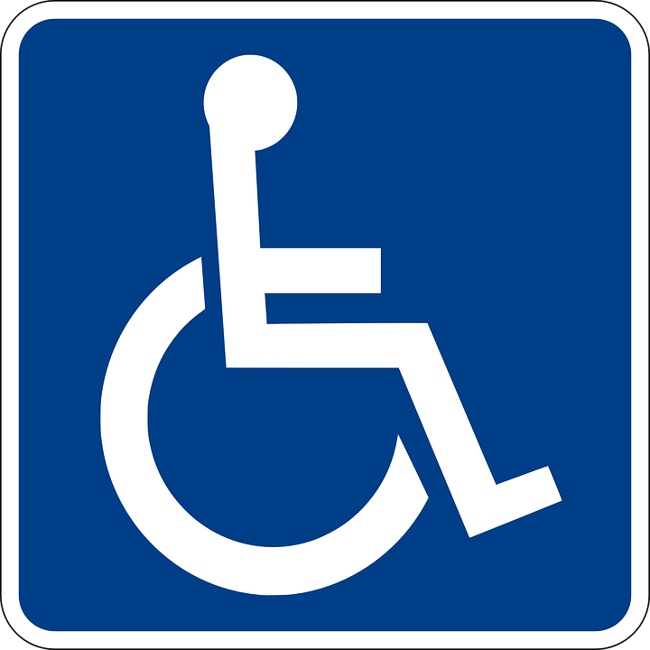 White wheelchair icon on a blue square, indicating accessible facilities.