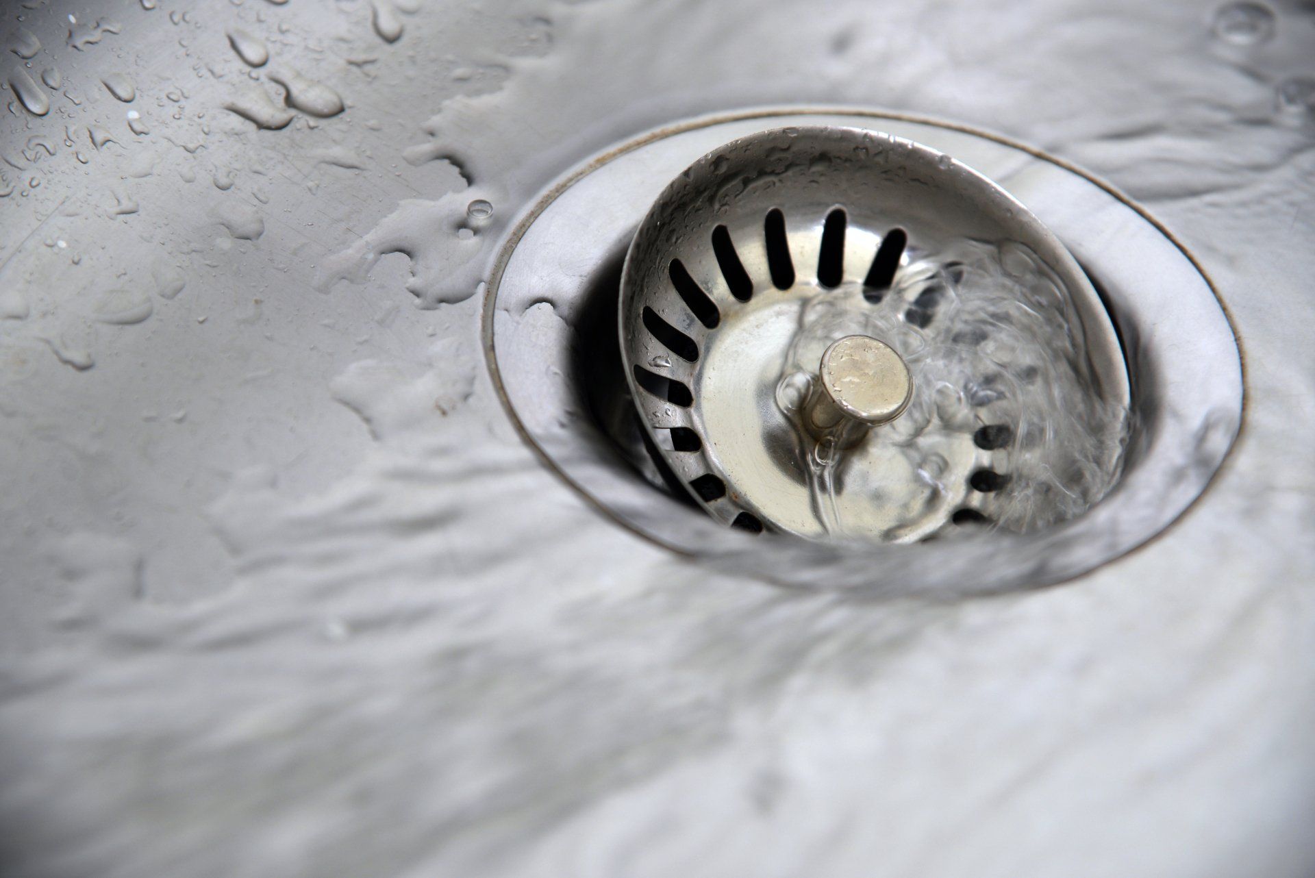 water draining in washbasin