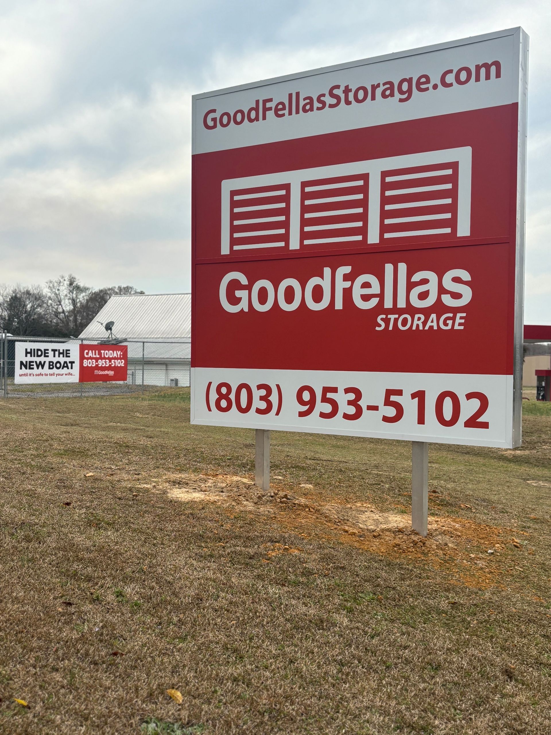 Goodfellas Storage sign and banner at facility entrance