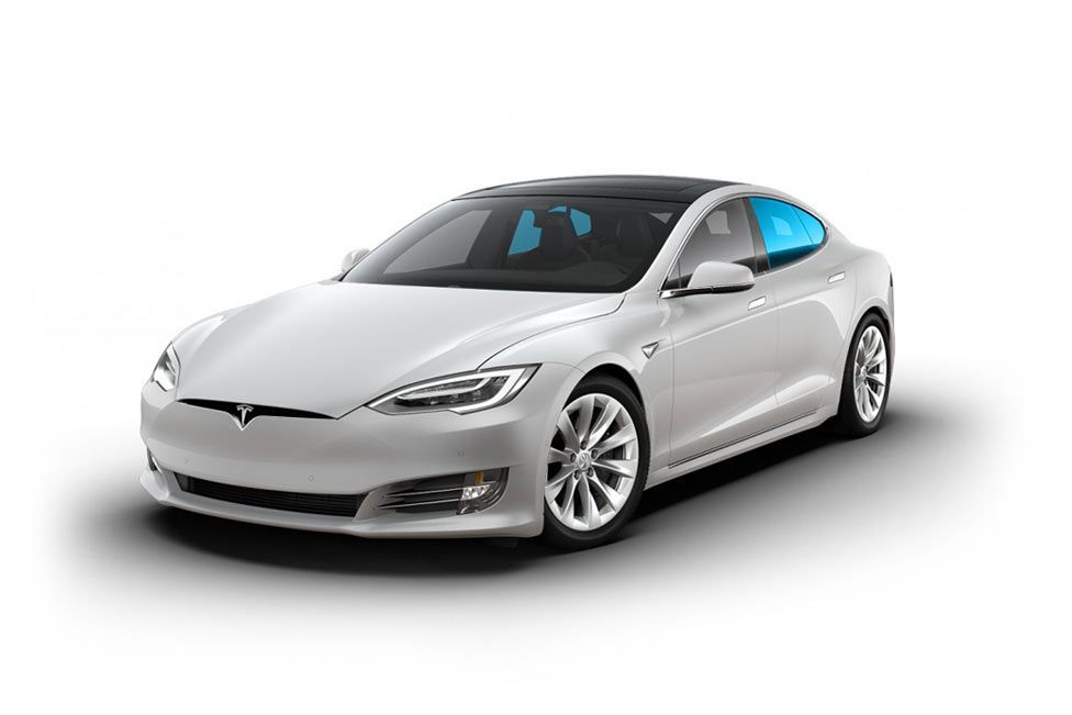A white tesla model s is shown on a white background.