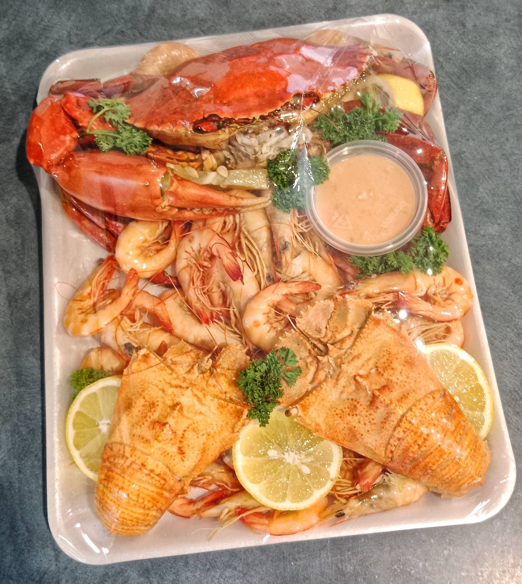 A Platter of Cooked Seafood, Including a Large Crab, Shrimp, and Two Lobster Tails — Glenmore Seafoods In Park Avenue, QLD