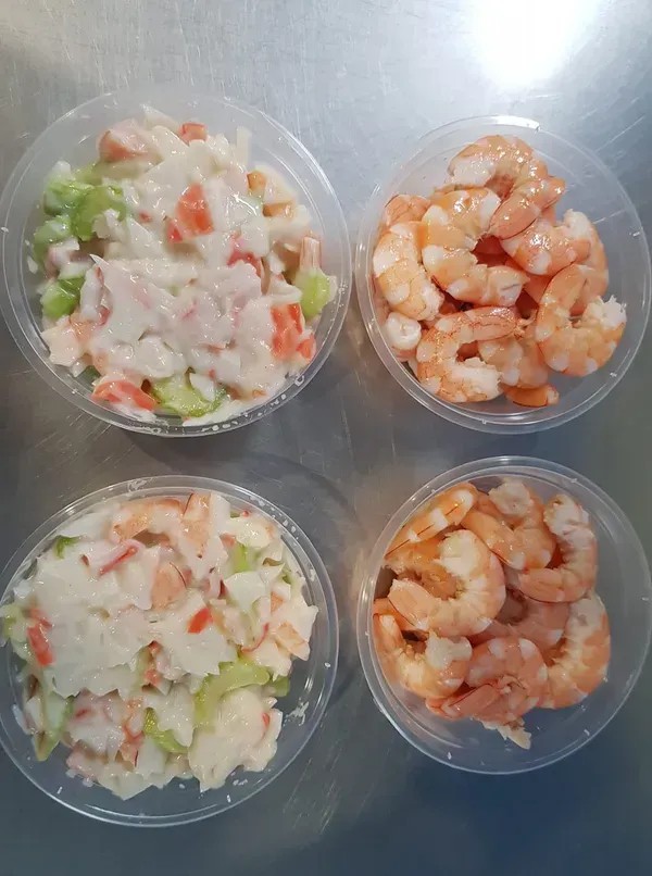 Four Clear Plastic Containers with Shrimp and Seafood Salad — Glenmore Seafoods In Park Avenue, QLD