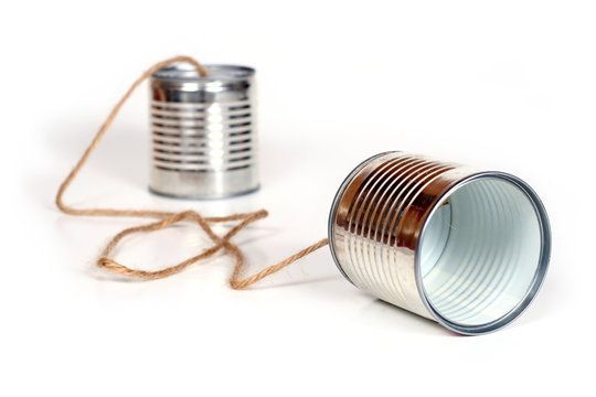Two tin cans with a string attached to them